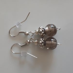 Stunning handcrafted boho earrings .